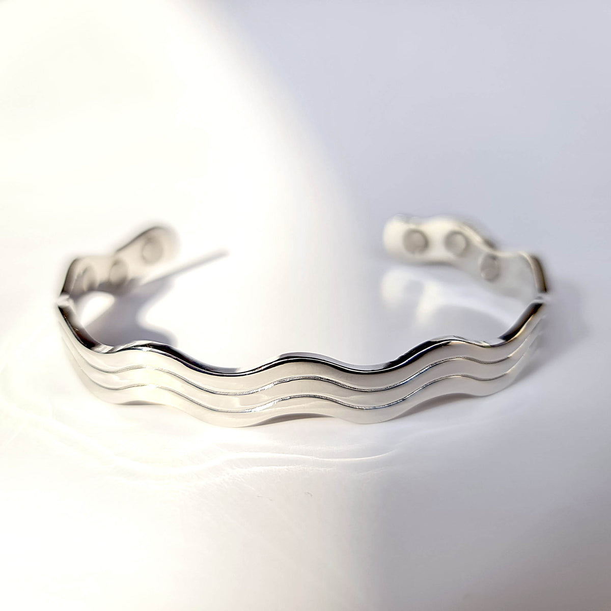 silver magnetic bangle