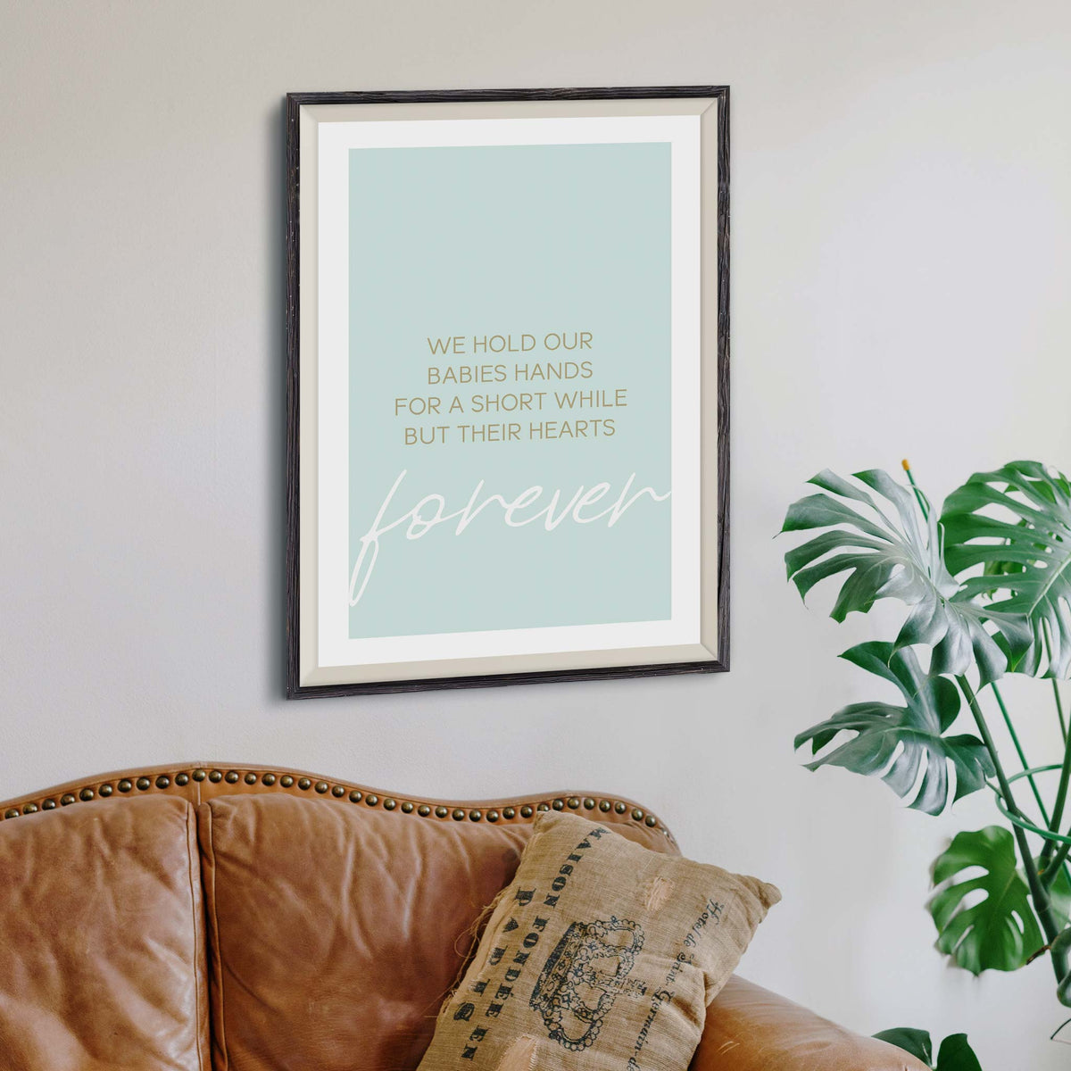 We hold our babies hands for a short while but their hearts forever