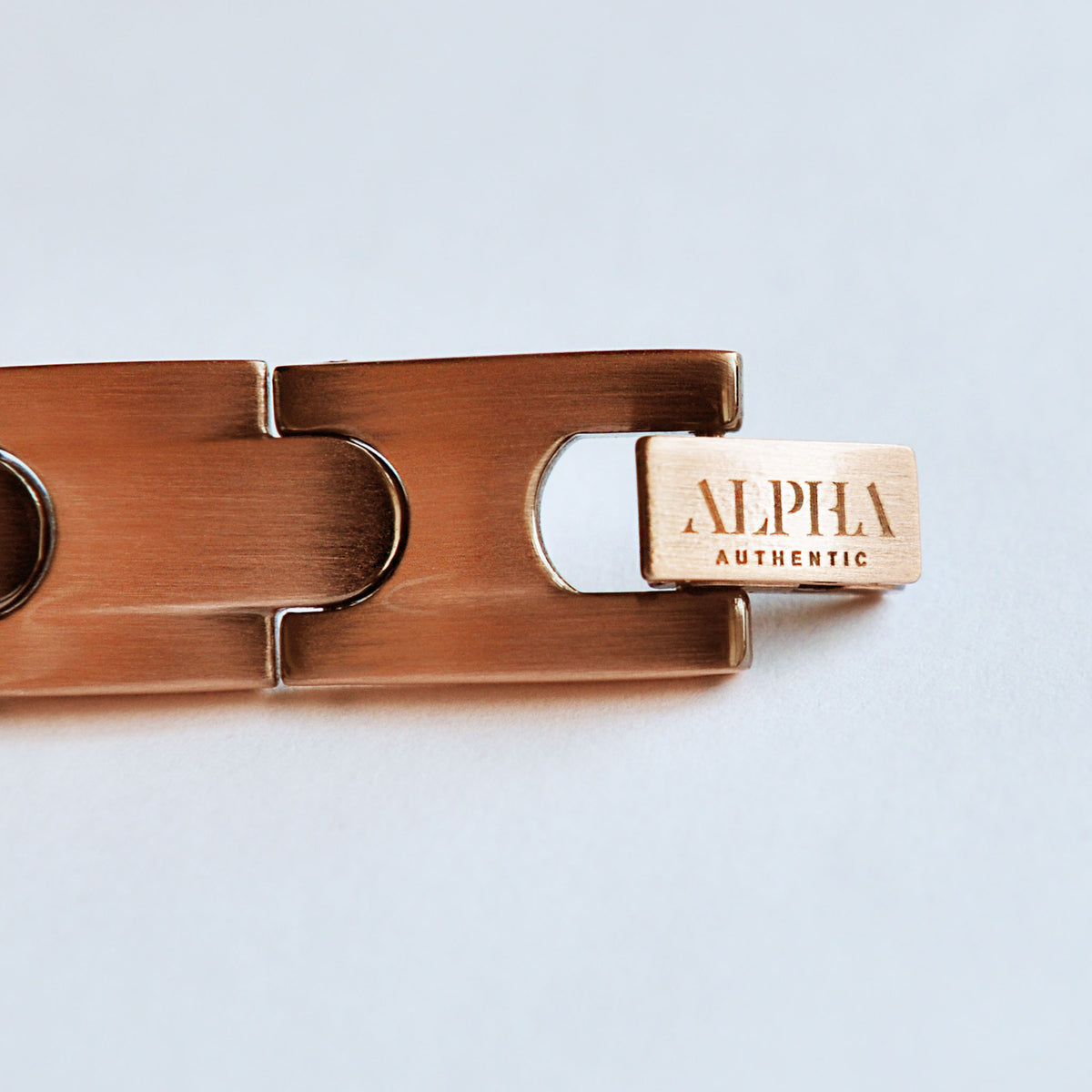 ALPHA logo engraved onto clasp