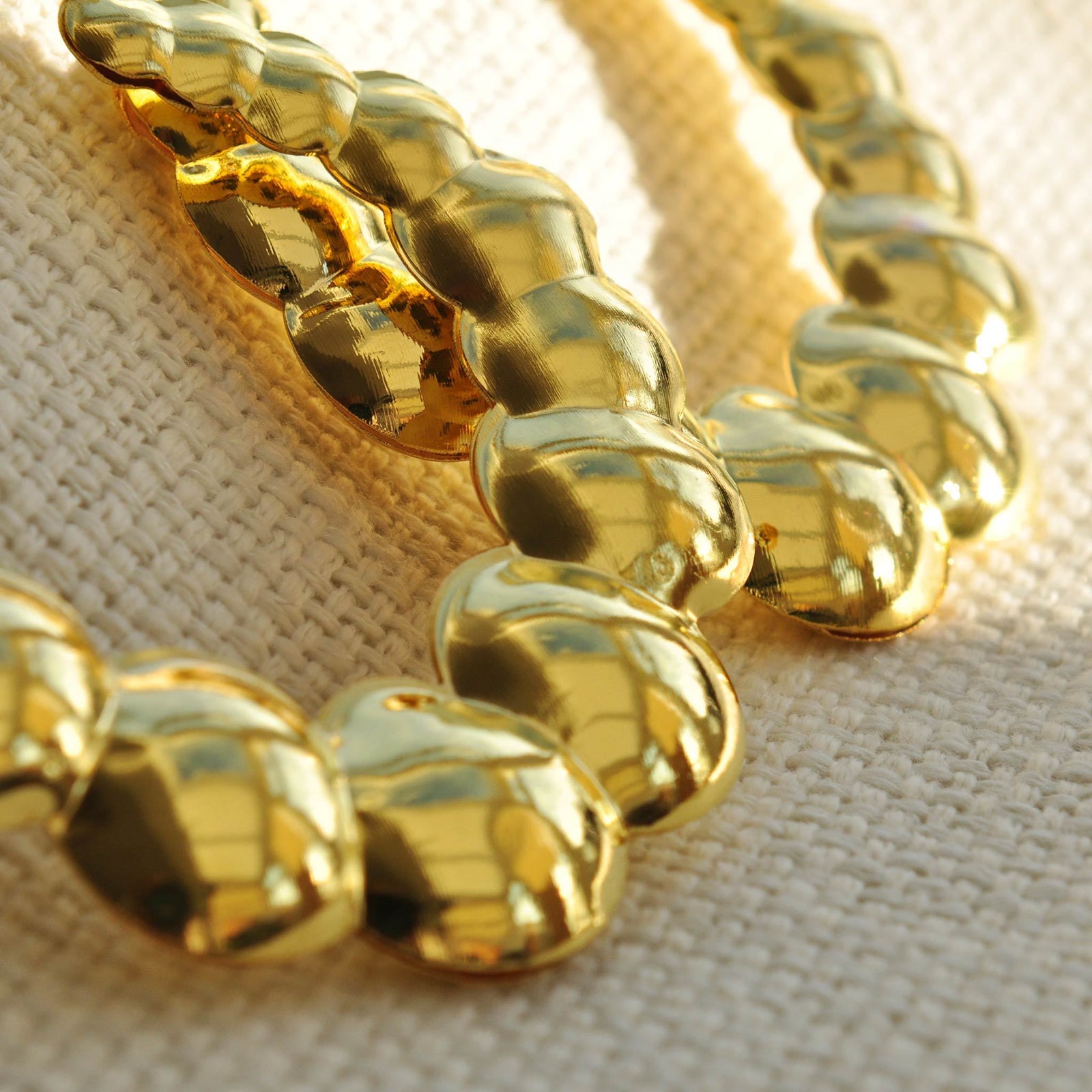 Gold statement earrings bubble